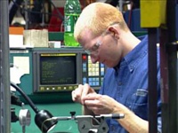 Kennebec Technology Employee in the shop